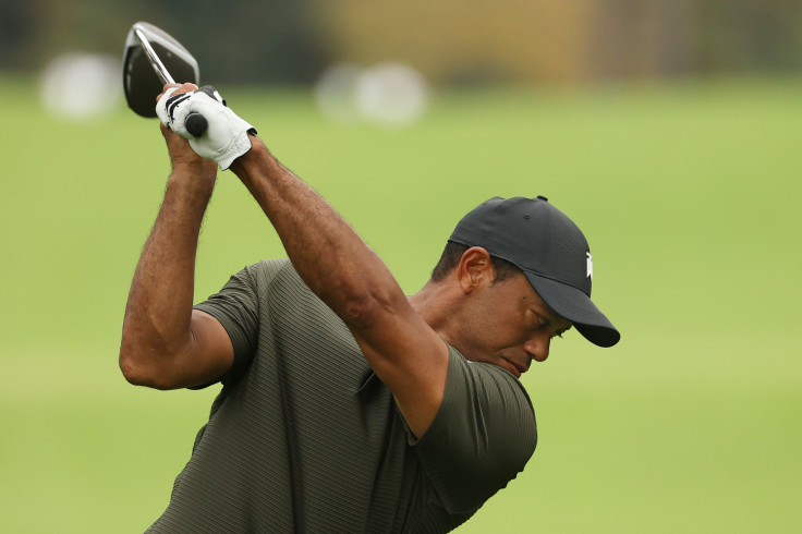 Tiger Woods of the United States plays his shot off the 17th tee during the first round of the Masters at Augusta National Golf Club 