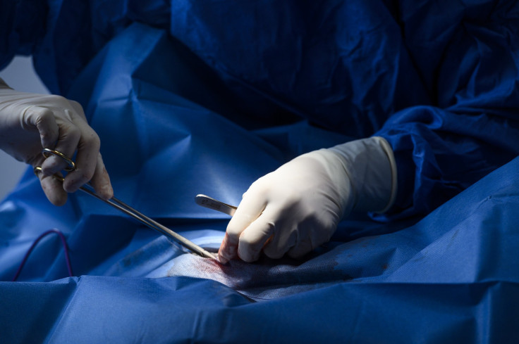 Detail of the hands of a veterinarian who operates on a dog in the town of Alpedrete at the Veterinary Hospital on April 30, 2020 in Madrid, Spain.