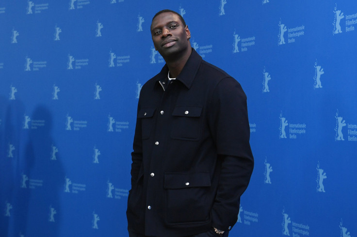 Omar Sy poses at the "Police" (Night Shift) photo call