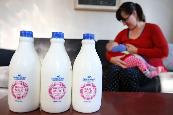  In this photo illustration, Sarah Ward breast feeds her daughter Esme at home with bottles of Lewis Road Creamery 'Breast Milk' in the foreground