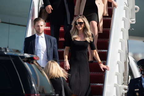 Eric Trump and Lara Trump exit Air Force One at the Palm Beach International Airport