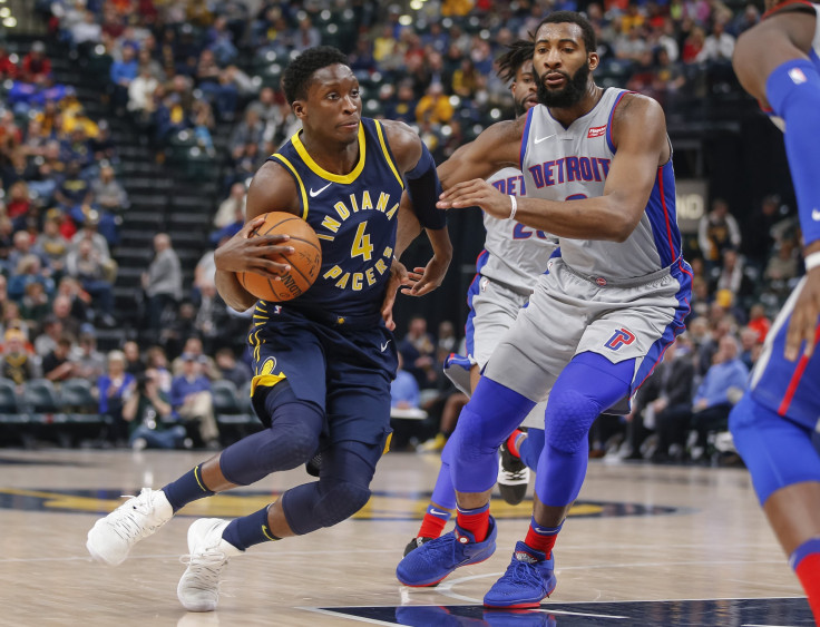 Victor Oladipo #4 of the Indiana Pacers drives to the basket against Andre Drummond #0 of the Detroit Pistons