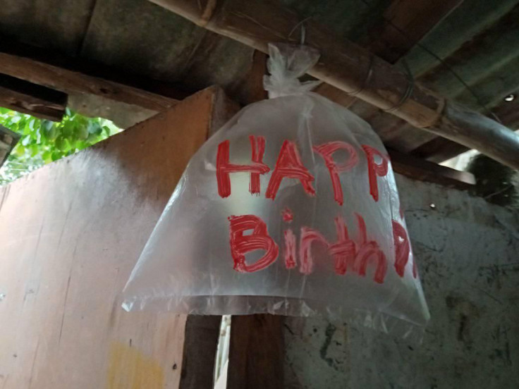 Filipino kids improvise to celebrate dad's birthday. 