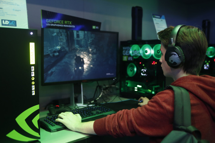 A gamer plays a video game on a computer equipped with a Nvidia GeForce RTX graphic card