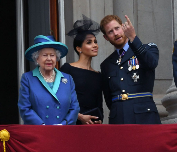 Queen Elizabeth with Prince Harry and Meghan Markle