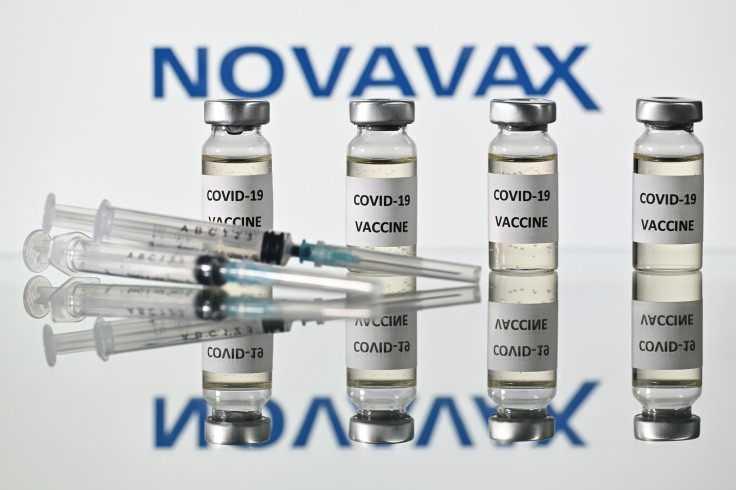 An illustration picture shows vials with Covid-19 Vaccine stickers attached and syringes with the logo of US biotech company Novavax