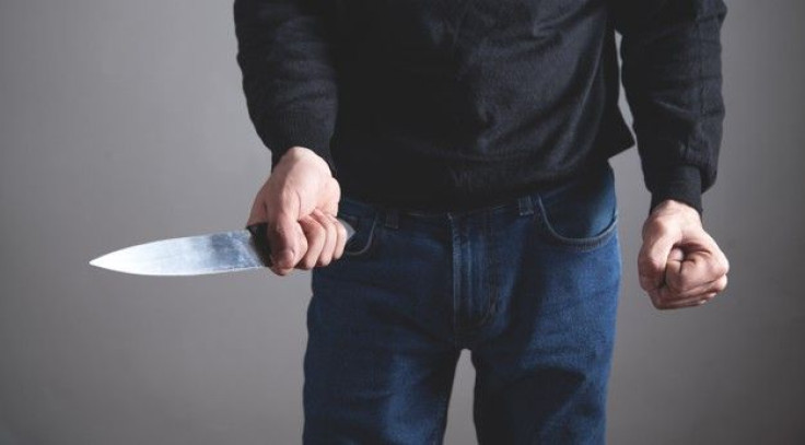 man holding knife