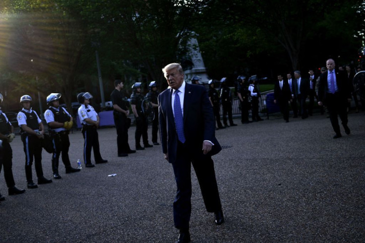 Trump escorted by the Secret Service