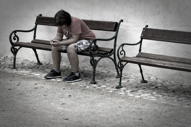 Teen using a phone