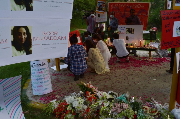 Activists light candles in memory of Noor Mukadam