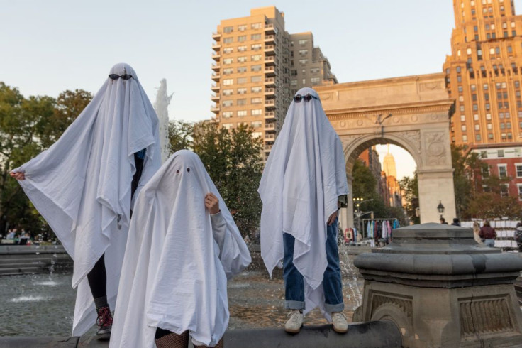 Representational image of people dressed as ghosts