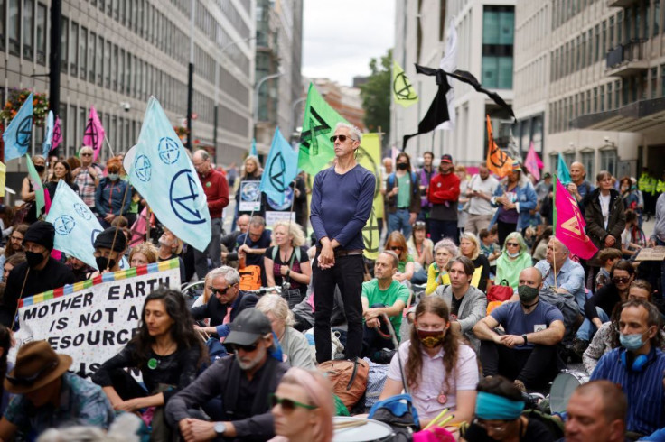 Climate activists from Extinction Rebellion hold a minute's silence for victims of climate change