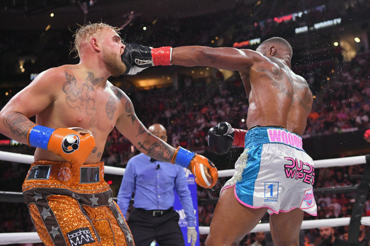 Tyron Woodley punches Jake Paul