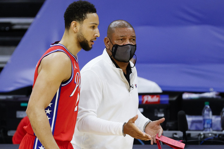 Head coach Doc Rivers of the Philadelphia 76ers speaks with Ben Simmons 