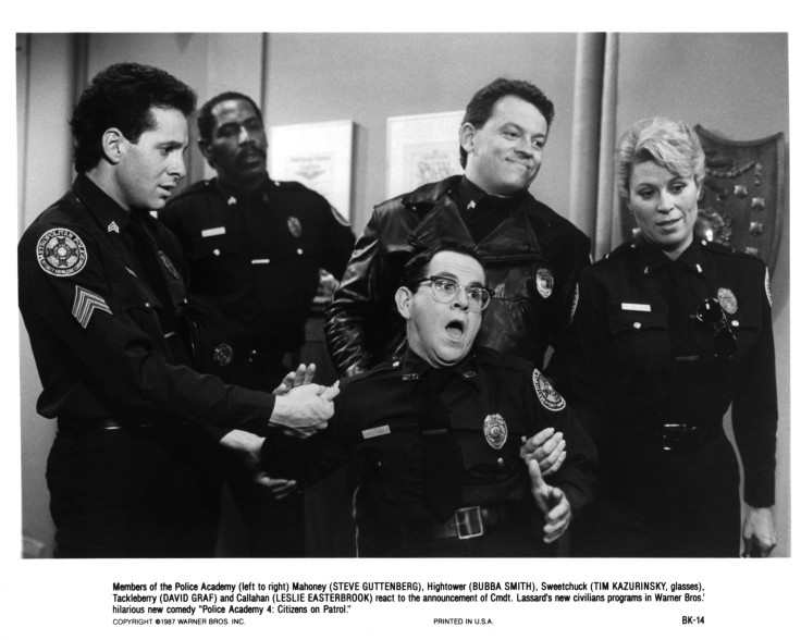 CIRCA 1987: Actor Steve Guttenberg, Bubba Smith, Tim Kazurinsky, David Graf and actress Leslie Easterbrook on set of the movie "Police Academy 4: Citizens on Patrol"