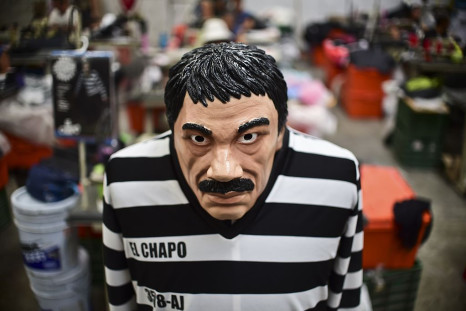 A costume and a mask representing Mexican drug trafficker Joaquin Guzman Loera, aka 'El Chapo'