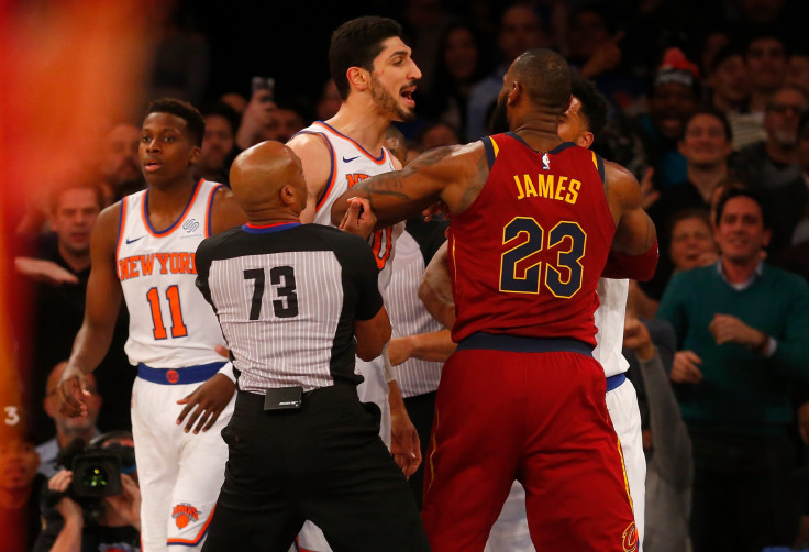Enes Kanter #00 of the New York Knicks confronts LeBron James #23 of the Cleveland Cavaliers