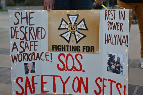 A sign calling for better safety on movie sets during a vigil held to honor cinematographer Halyna Hutchins 