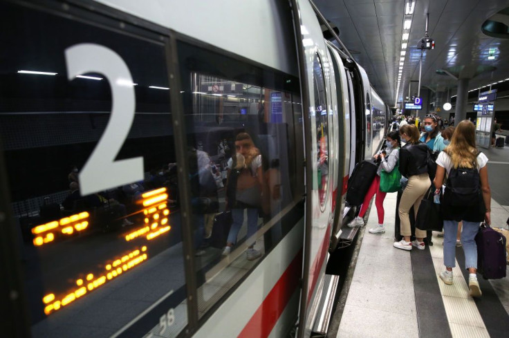 Passengers board an Intercity Express