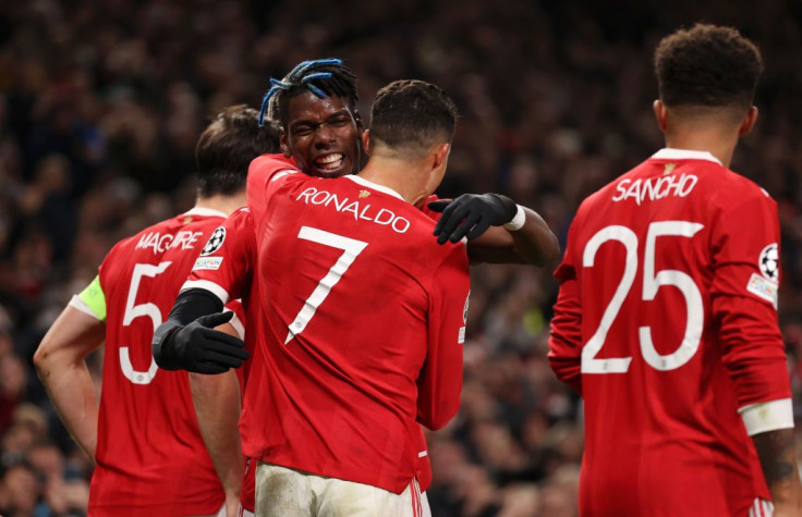 Cristiano Ronaldo of Manchester United celebrates after scoring his sides third goal with Paul Pogba