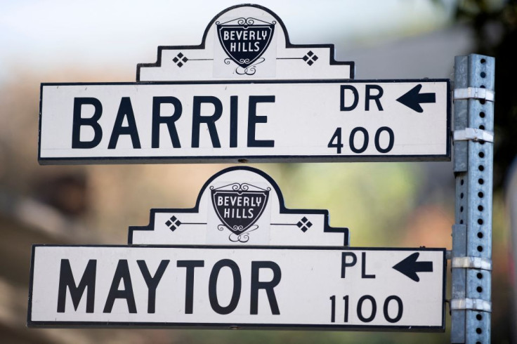 A street sign marks the 1100 block of Maytor place where Jacqueline Avant's house is at the top of the hill