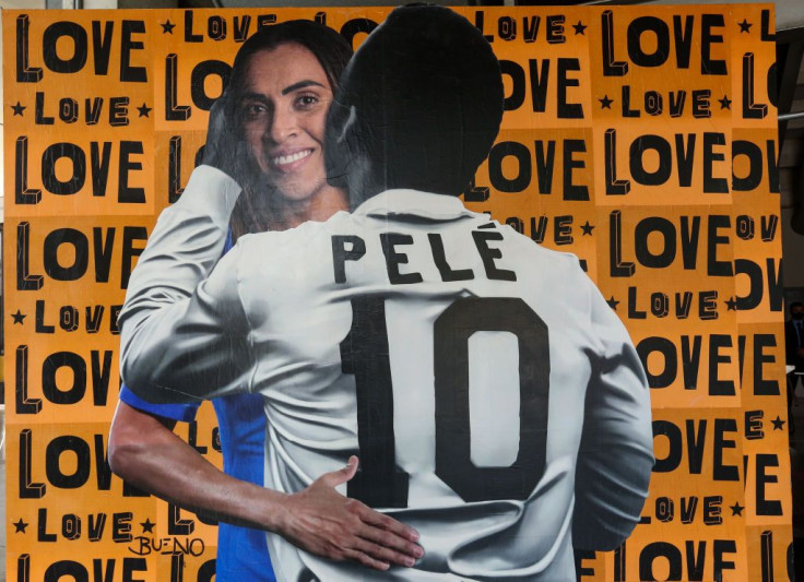 Street art depicting Pelé hugging soccer player Marta Vieira da Silva 