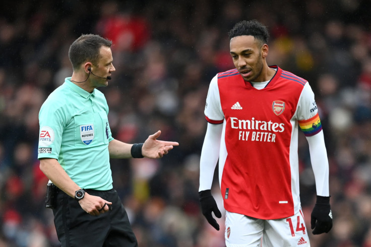 Referee Stuart Attwell speaks to Pierre-Emerick Aubameyang of Arsenal