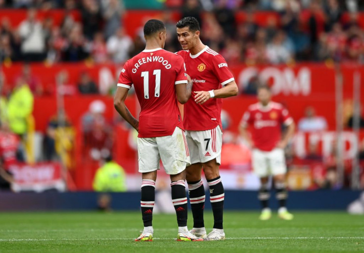 Mason Greenwood with Cristiano Ronaldo