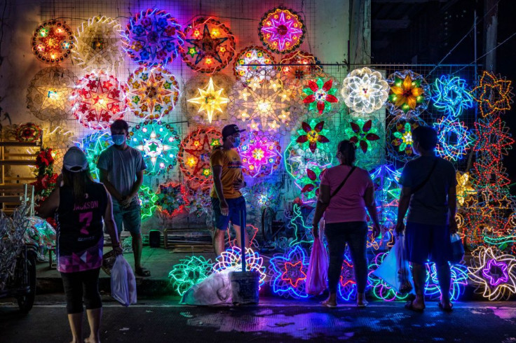 Vendors sell lanterns at a Christmas decorations market in Manila