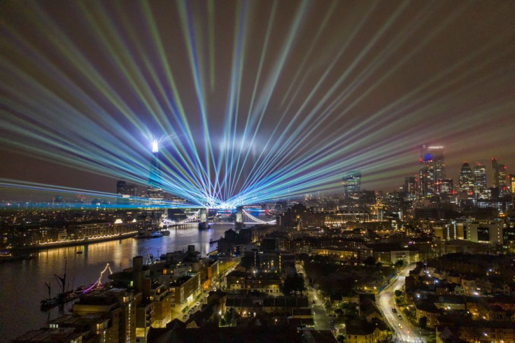 A laser show replaces the usual New Years Eve firework display by Tower Bridge