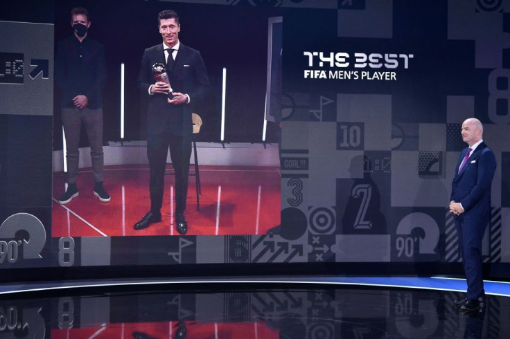 FIFA President Gianni Infantino speaks with the Best FIFA Mens Player 2021 award winner Robert Lewandowski