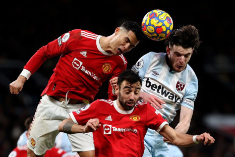 Cristiano Ronaldo and Bruno Fernandes with Declan Rice