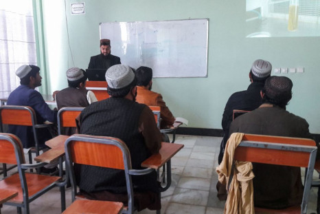 Students attend a class in the Helmand university