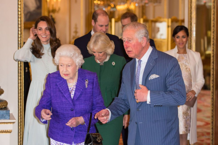 Queen Elizabeth along with Charles, Camilla, William, Kate, Harry and Meghan
