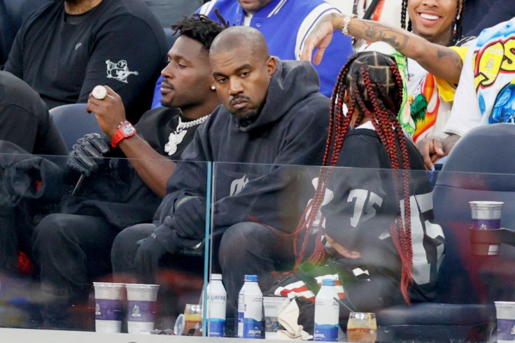 Kanye West with North West and Antonio Brown