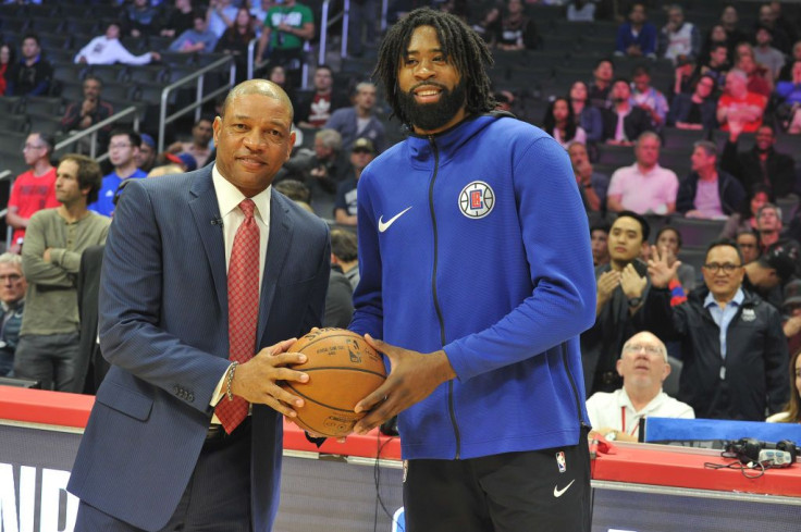 Coach Doc Rivers and DeAndre Jordan 