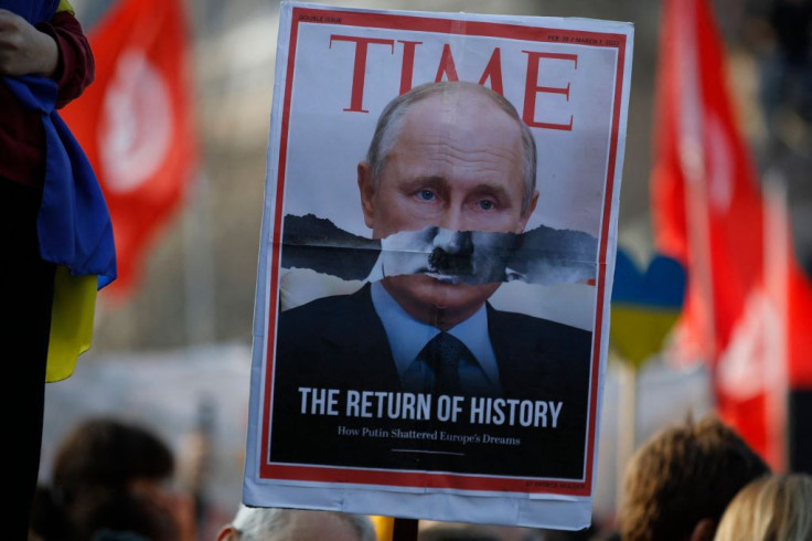 This photograph shows an imitation of a magazine cover with Vladimir Putin's face with the mustache of Adolf Hitler
