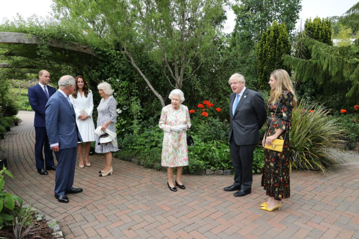 Queen Elizabeth II, Prince Charles, Camilla, Prince William and Kate Middleton with Boris and Carrie Johnson