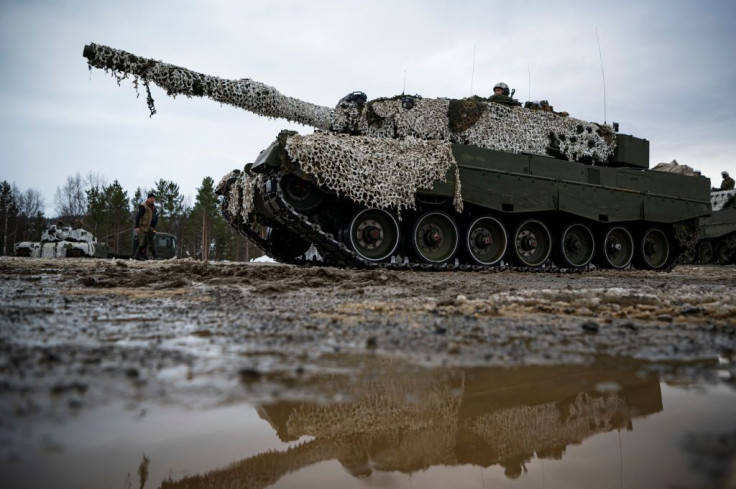 Soldiers from the Norwegian Armed Forces operate a tank as they participate in the international military exercise Cold Response 22, at Setermoen, North of in Norway, on March 22, 2022. 