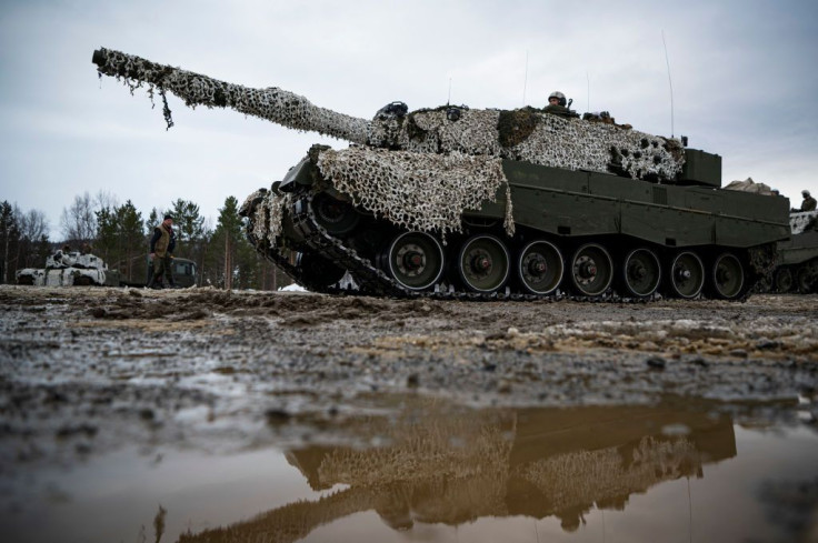 Soldiers from the Norwegian Armed Forces operate a tank as they participate in the international military exercise Cold Response 22, at Setermoen, North of in Norway, on March 22, 2022.