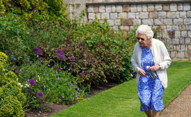 Queen Elizabeth II views a flower bed in the grounds of Windsor Castle, after she was presented with a Duke of Edinburgh rose, named in memory of her late husband Prince Philip