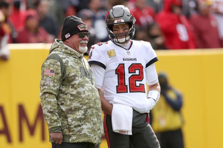 Head coach Bruce Arians of the Tampa Bay Buccaneers talks with quarterback Tom Brady