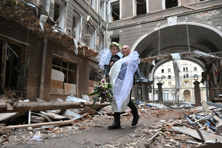 Nastya Gracheva and Anton Sokolov pose for a photograph