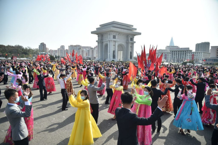 Students and youth take part in a dancing party to commemorate the 10th anniversary of Kim Jong Un