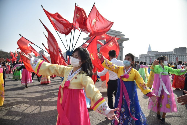 Students and youth take part in a dancing party to commemorate the 10th anniversary of Kim Jong Un