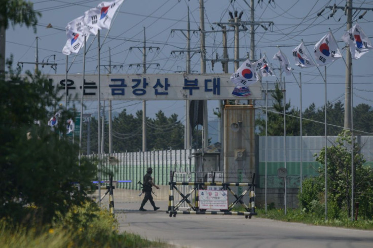 A South Korean soldier guards the entrance to the camp Kumgang Mountain military base