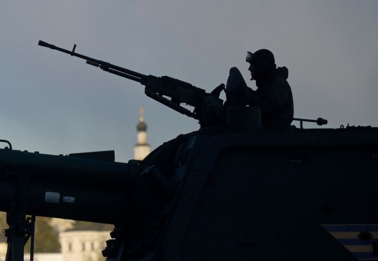 Russian military vehicles drive along the Garden Ring road towards the Red Square for a rehearsal of the Victory Day military parade, in central Moscow