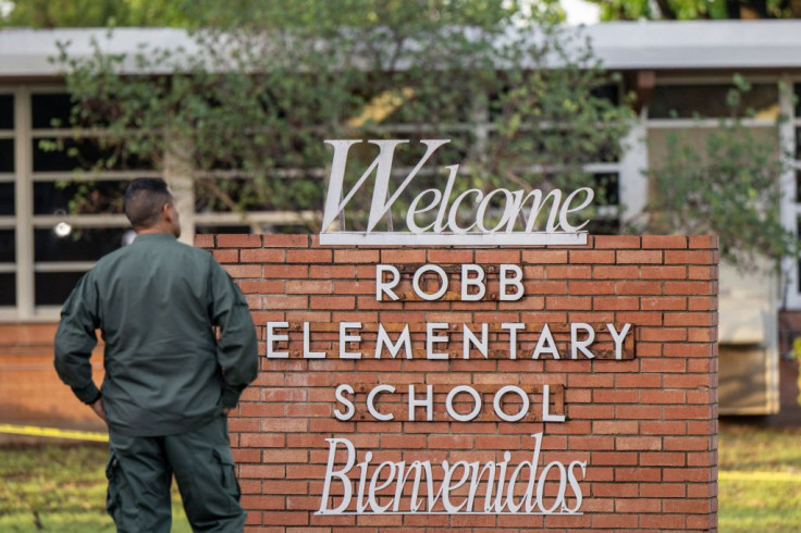 A law enforcement officer stands outside the Robb Elementary School on May 25, 2022 in Uvalde, Texas. 