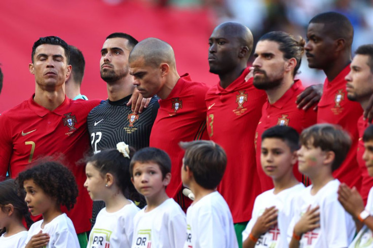 Cristiano Ronaldo of Portugal sings the national anthem with his team mates