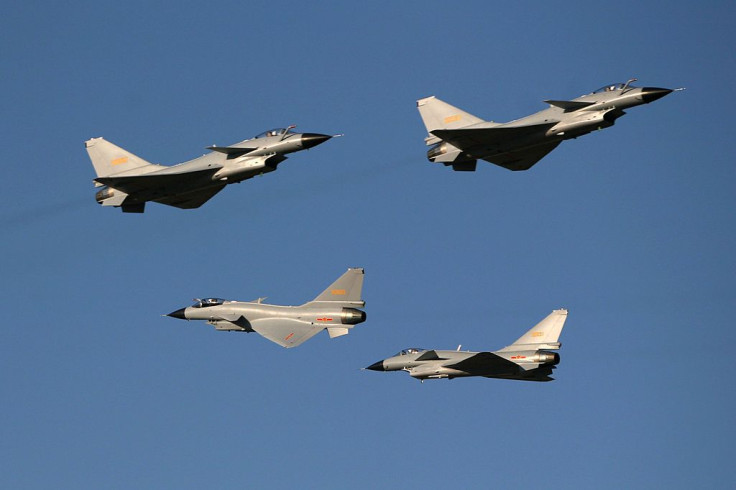 A group of J-10 air fighters perform during an aerial show held to mark the 60th anniversary of the founding of Chinese People's Liberation Army (PLA) Air Force on November 15, 2009 in Beijing, China. 